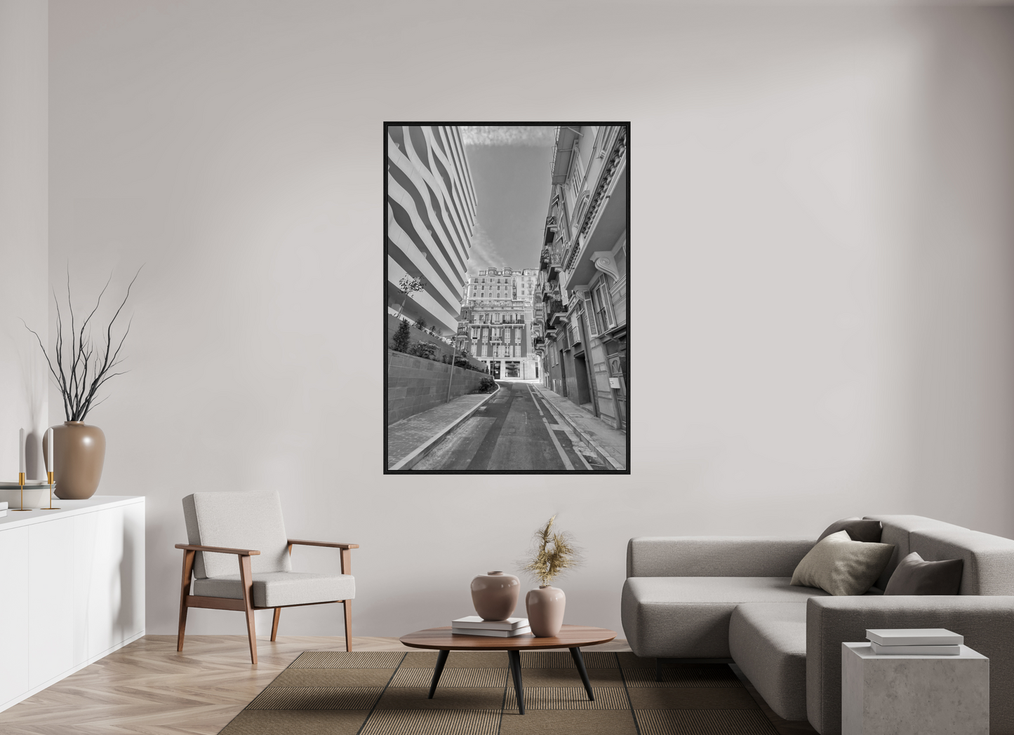 Square framed black-and-white city photo print in thin black frame, street view