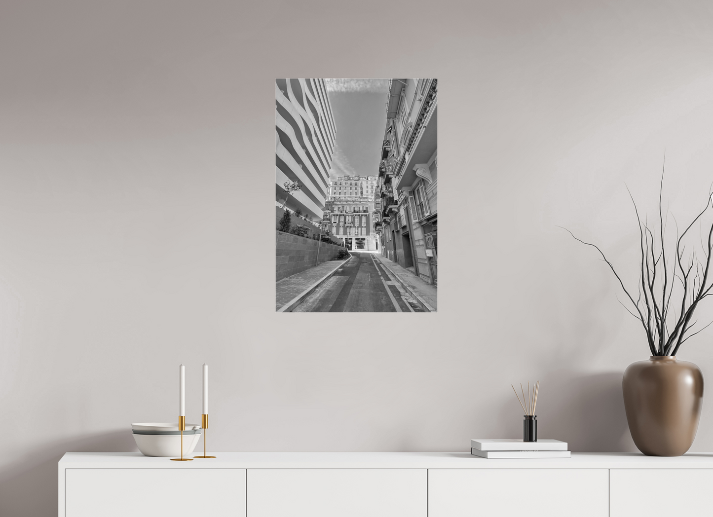 Framed black-and-white street photo print with a narrow path between tall city buildings