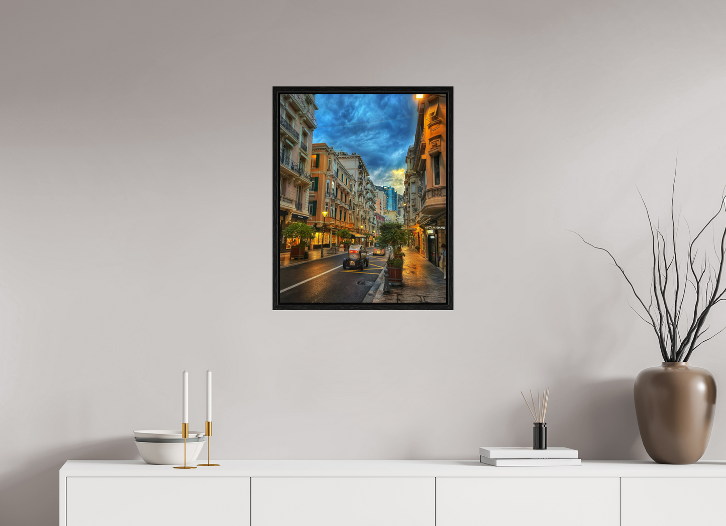 Small black floater framed city street photo print under acrylic glass, nighttime glow