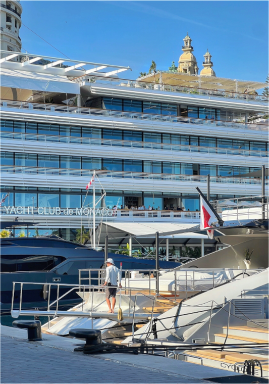 Acrylic photo print artwork with marina yachts and a large blue building with domes