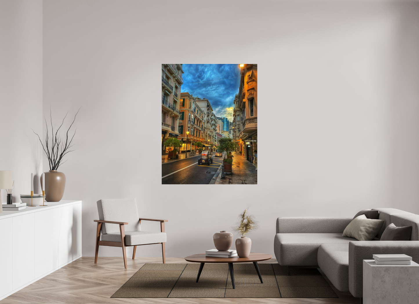 Framed city street photo print under acrylic glass with black floater frame, glowing buildings