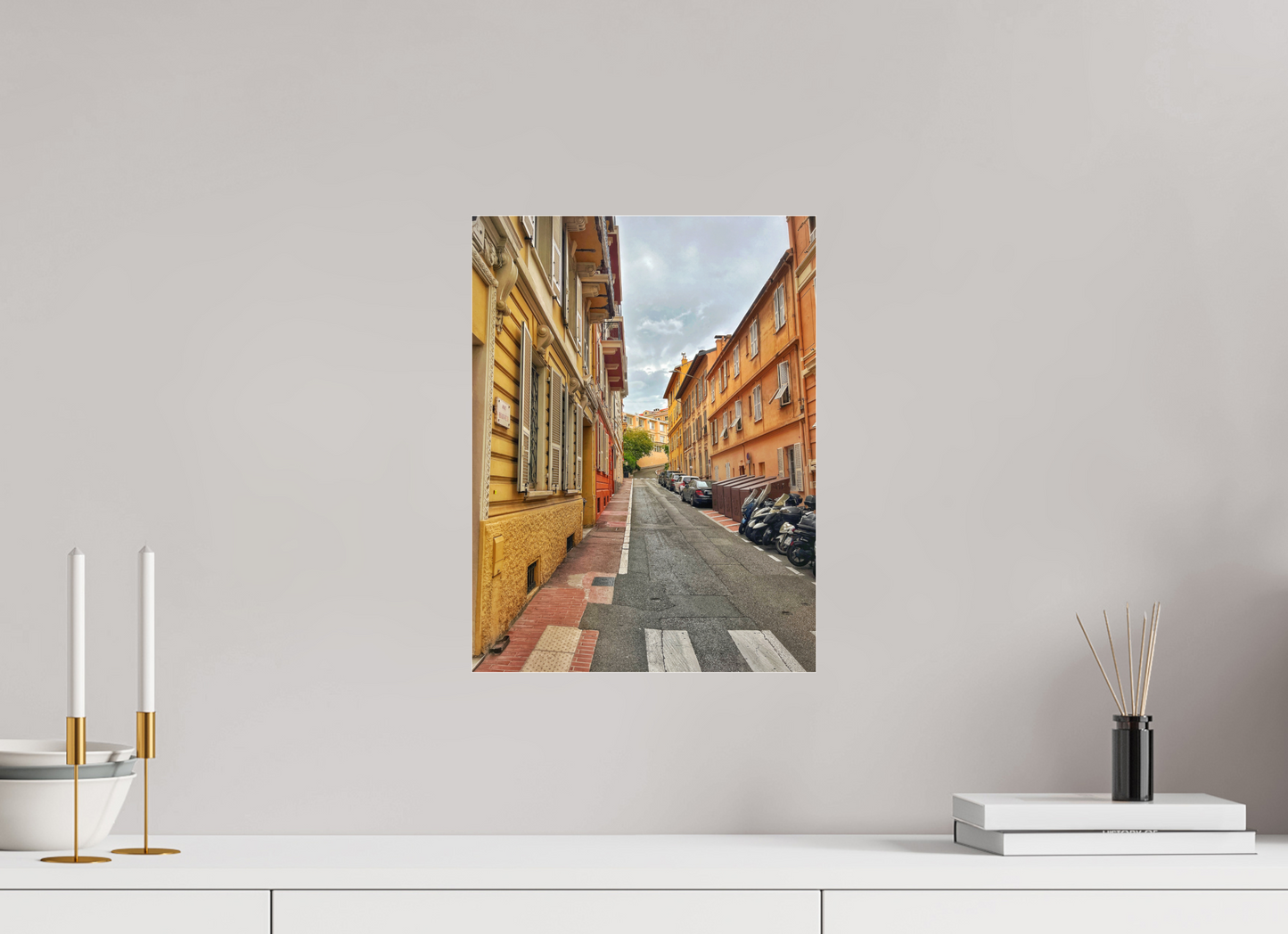Square street photo print showing a long alley and parked cars along the curb