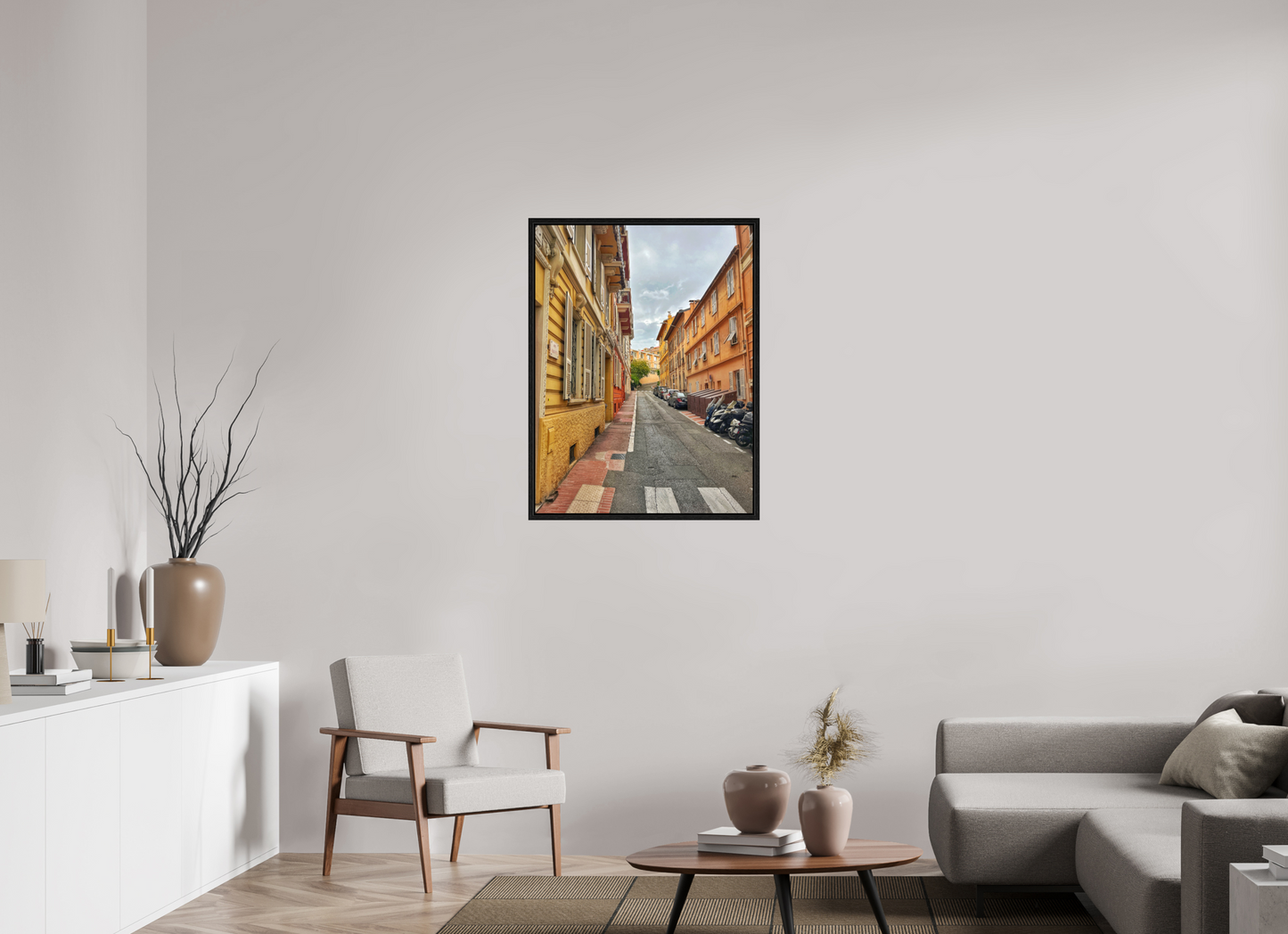 Square framed photo print of a narrow city street with colorful facades and a blue sky