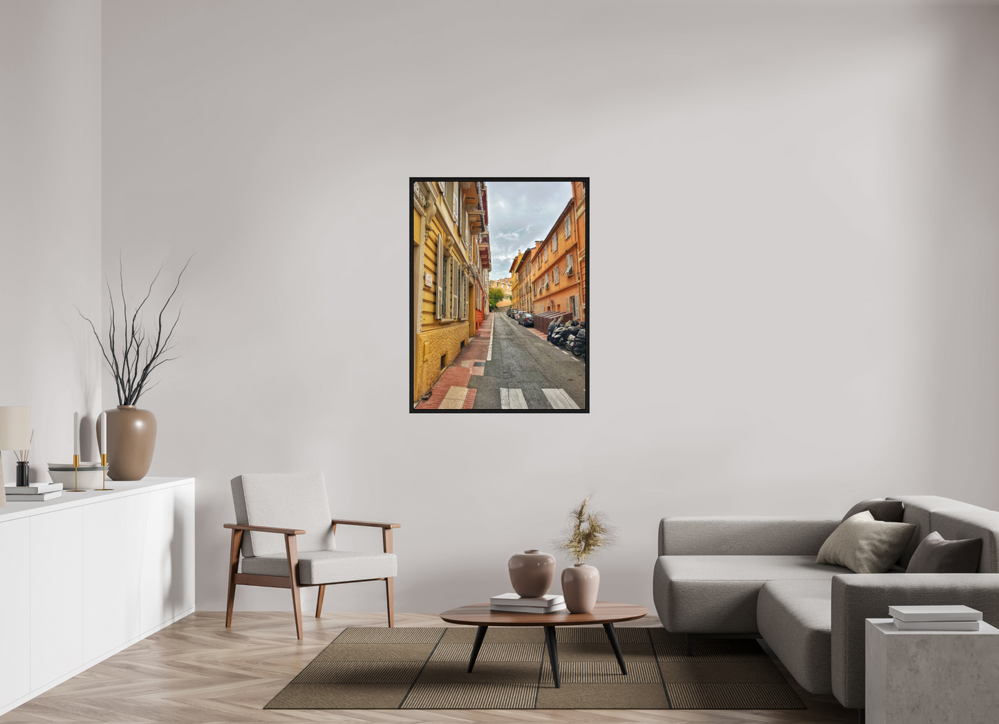 Square framed photo print featuring a narrow street with warm-toned buildings and stone pavement