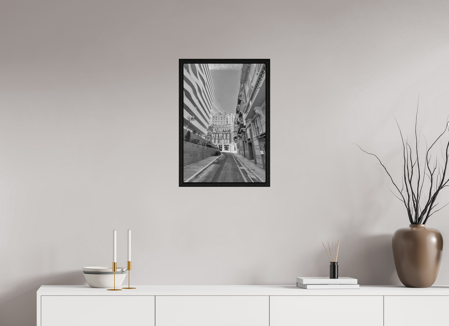 Square framed grayscale street photo under acrylic with black floater frame