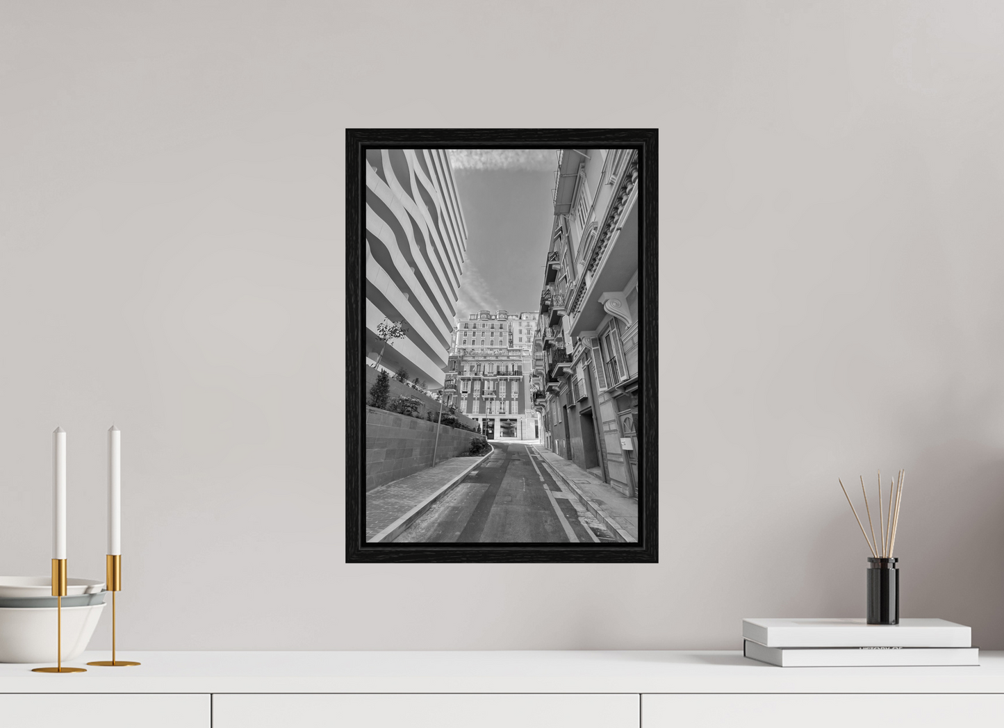 Square grayscale street photo under acrylic in black floater frame