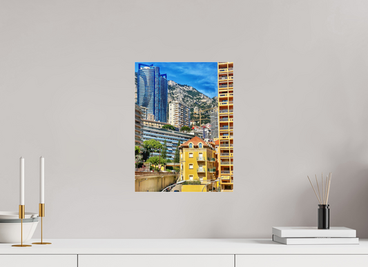 Square cityscape wall art print with yellow building facade and high-rise towers
