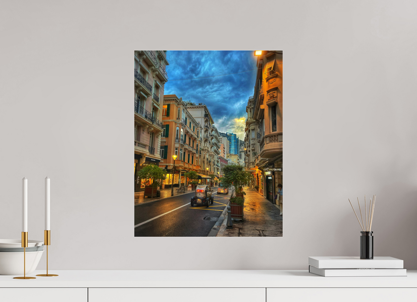 Wall-mounted city street photo in acrylic glass floater frame, streetlights at dusk