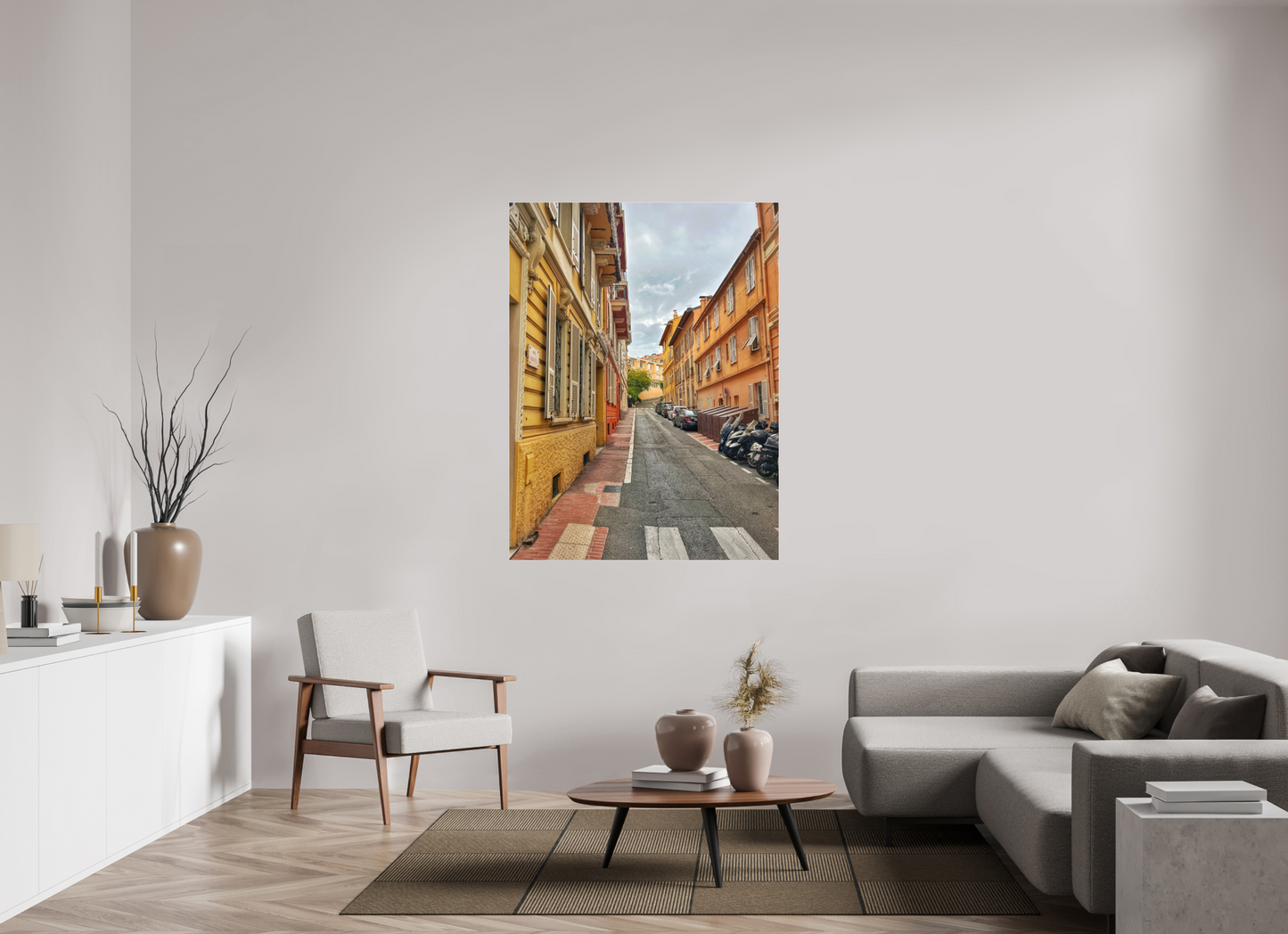 Square framed photo print of a narrow European street with colorful buildings and cobblestones